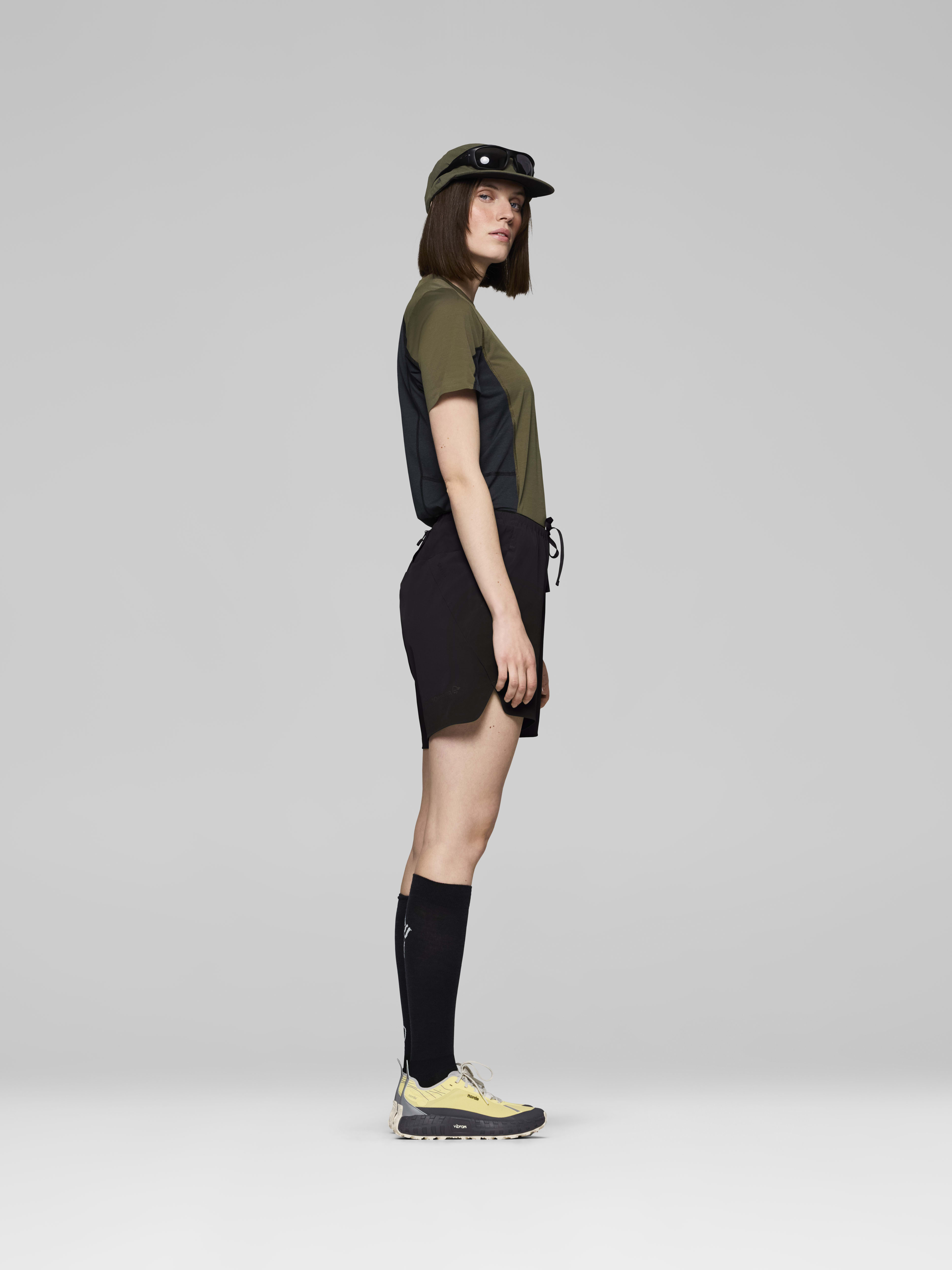 Female Look side image of senja flex1 8" Shorts Caviar Black