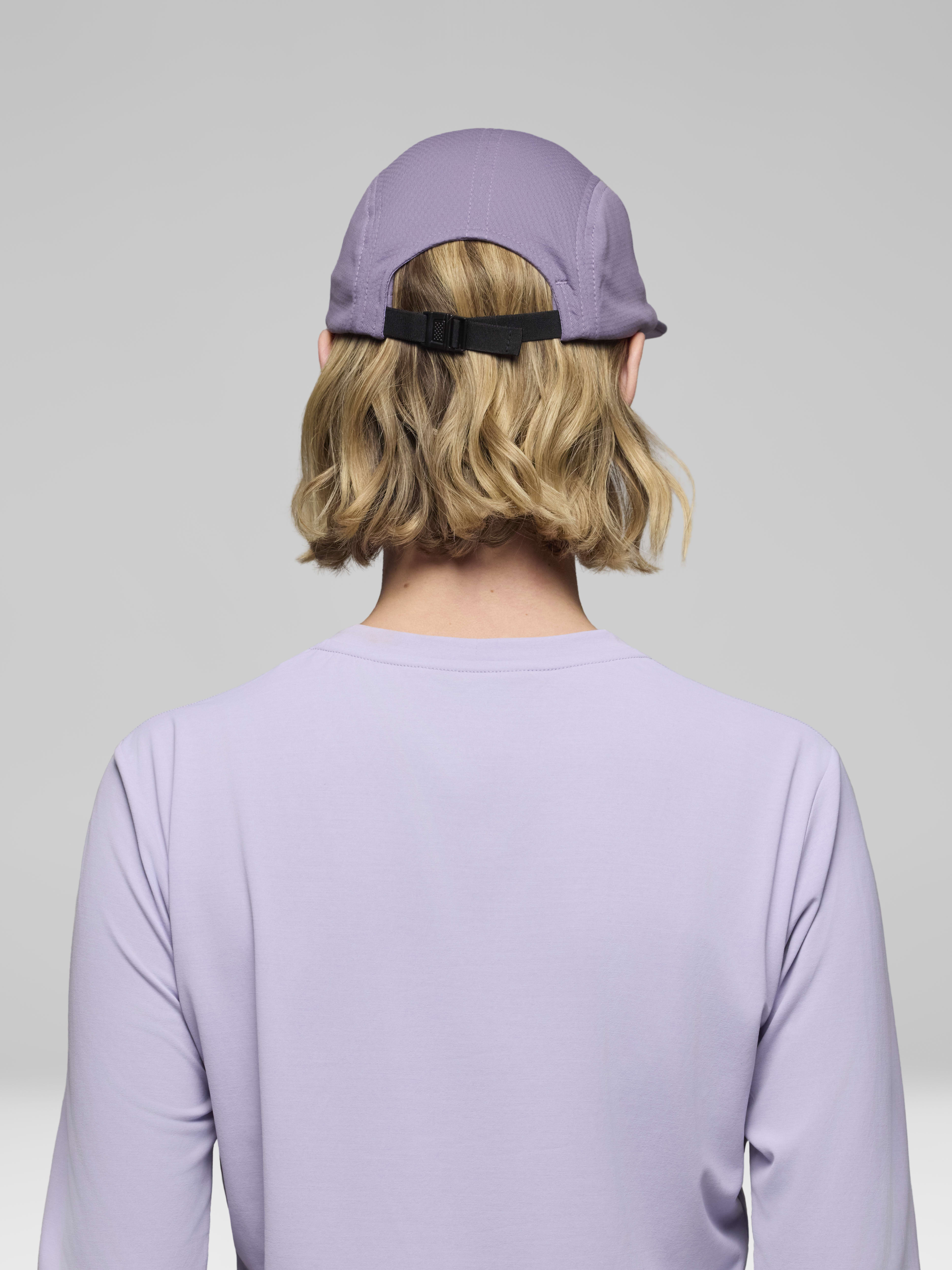 Female Look back image of senja Cap Purple Sage