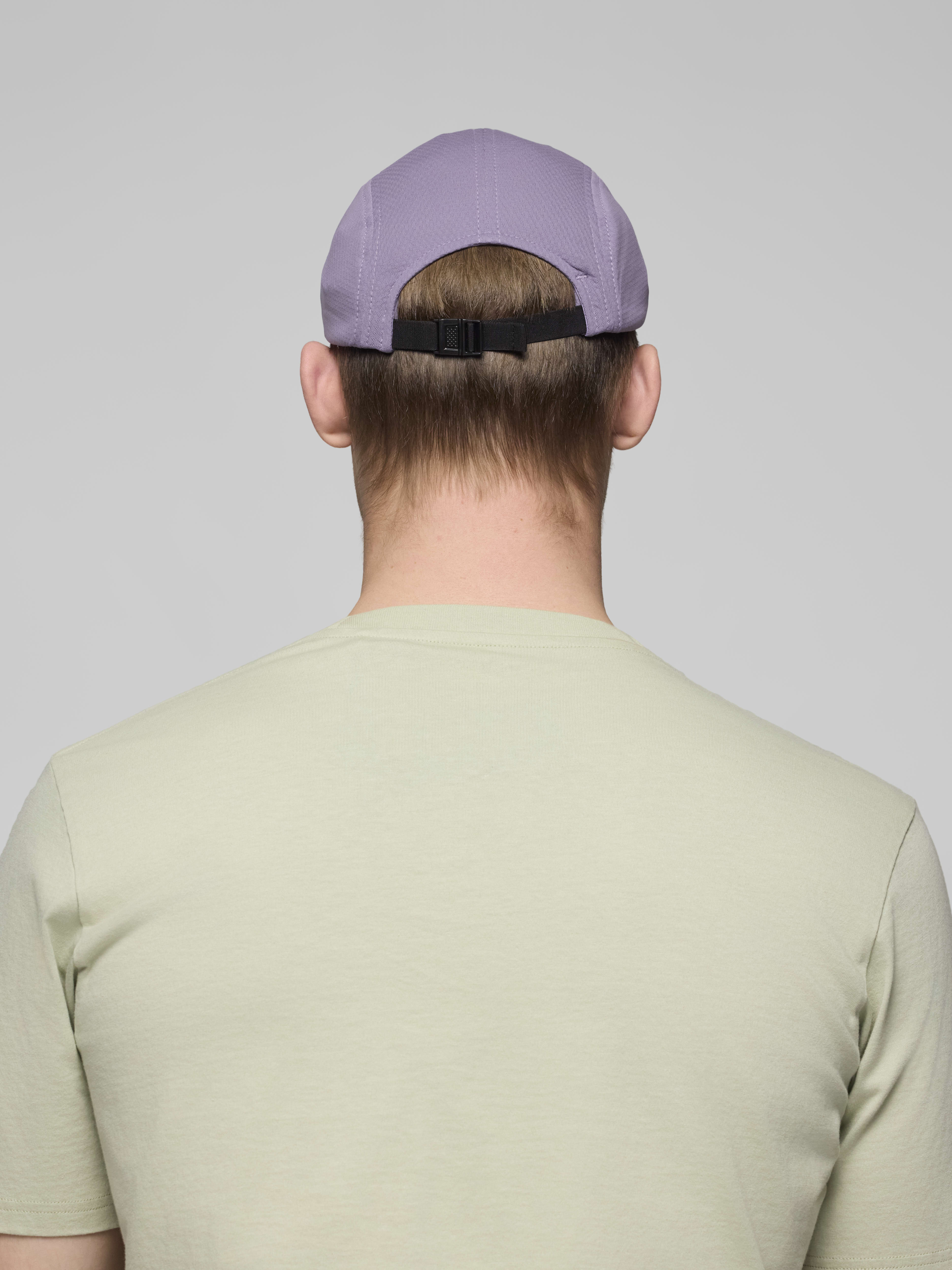 Female Look back image of senja Cap Purple Sage