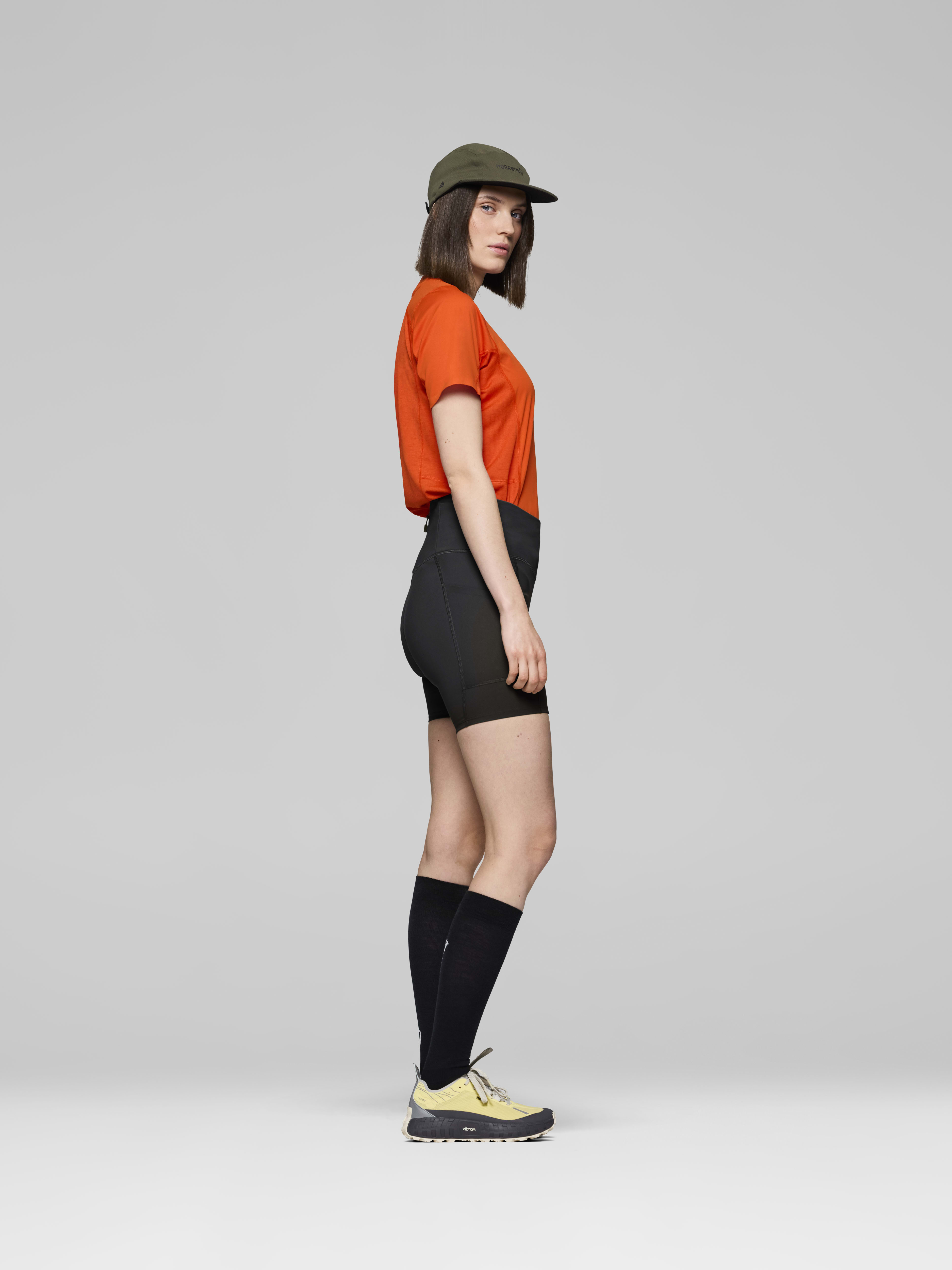 Female Look side image of senja equaliser stretch 6" Tights Caviar Black