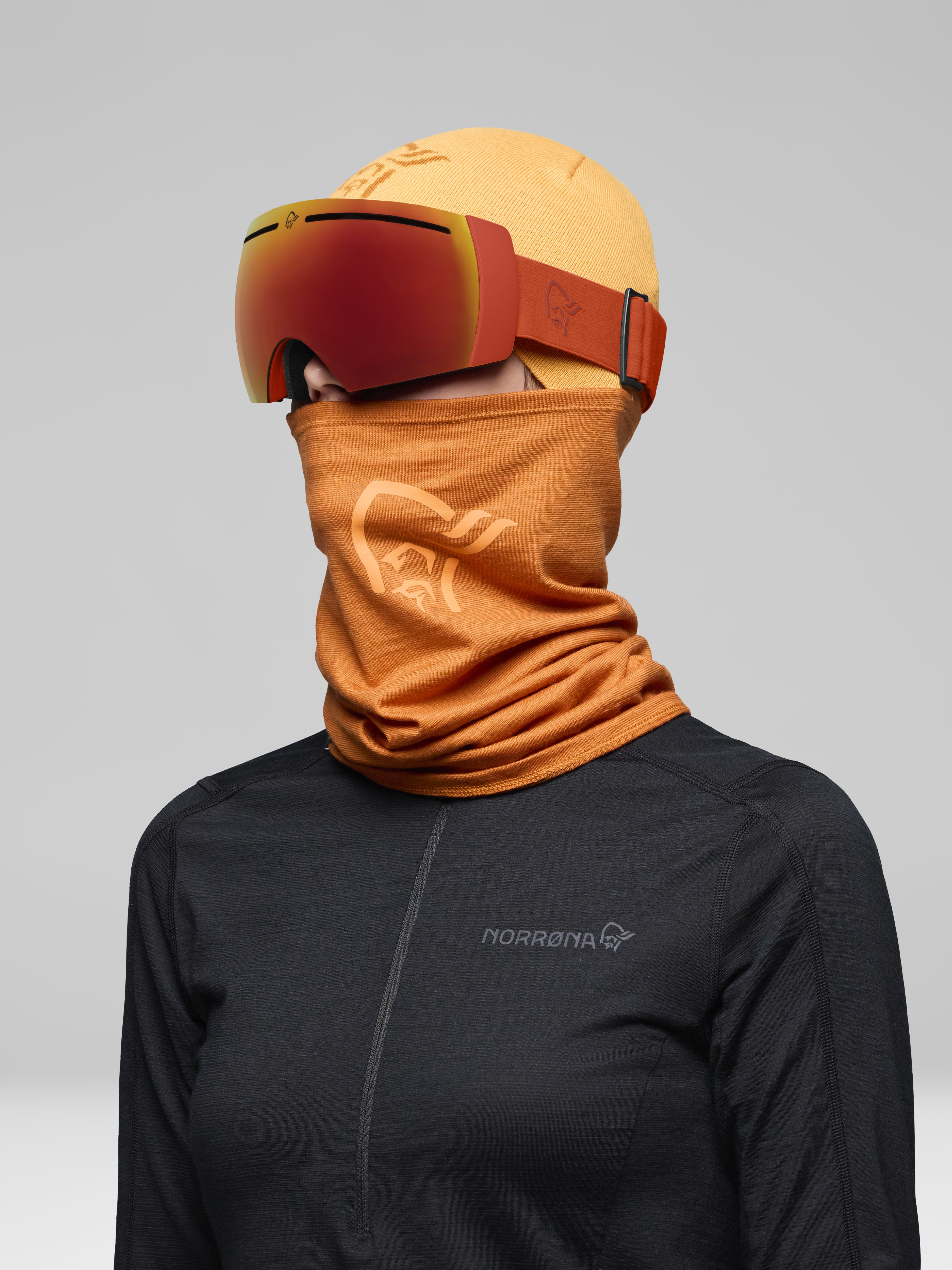 Female Look side image of lofoten Goggles Scarlet Ibis/Gold Fusion Mirror S2