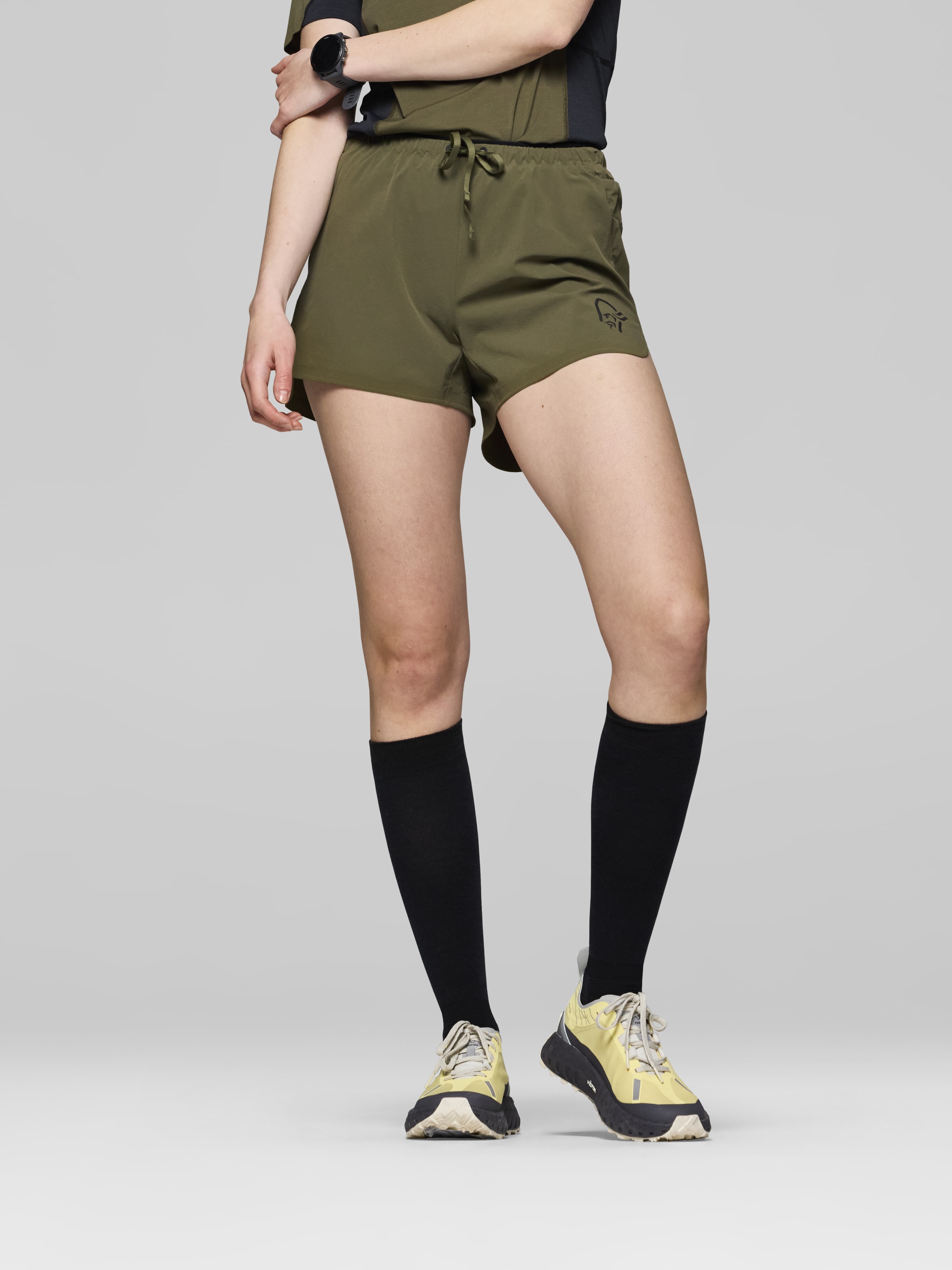 Female Look image of senja flex1 4" Shorts Olive Night