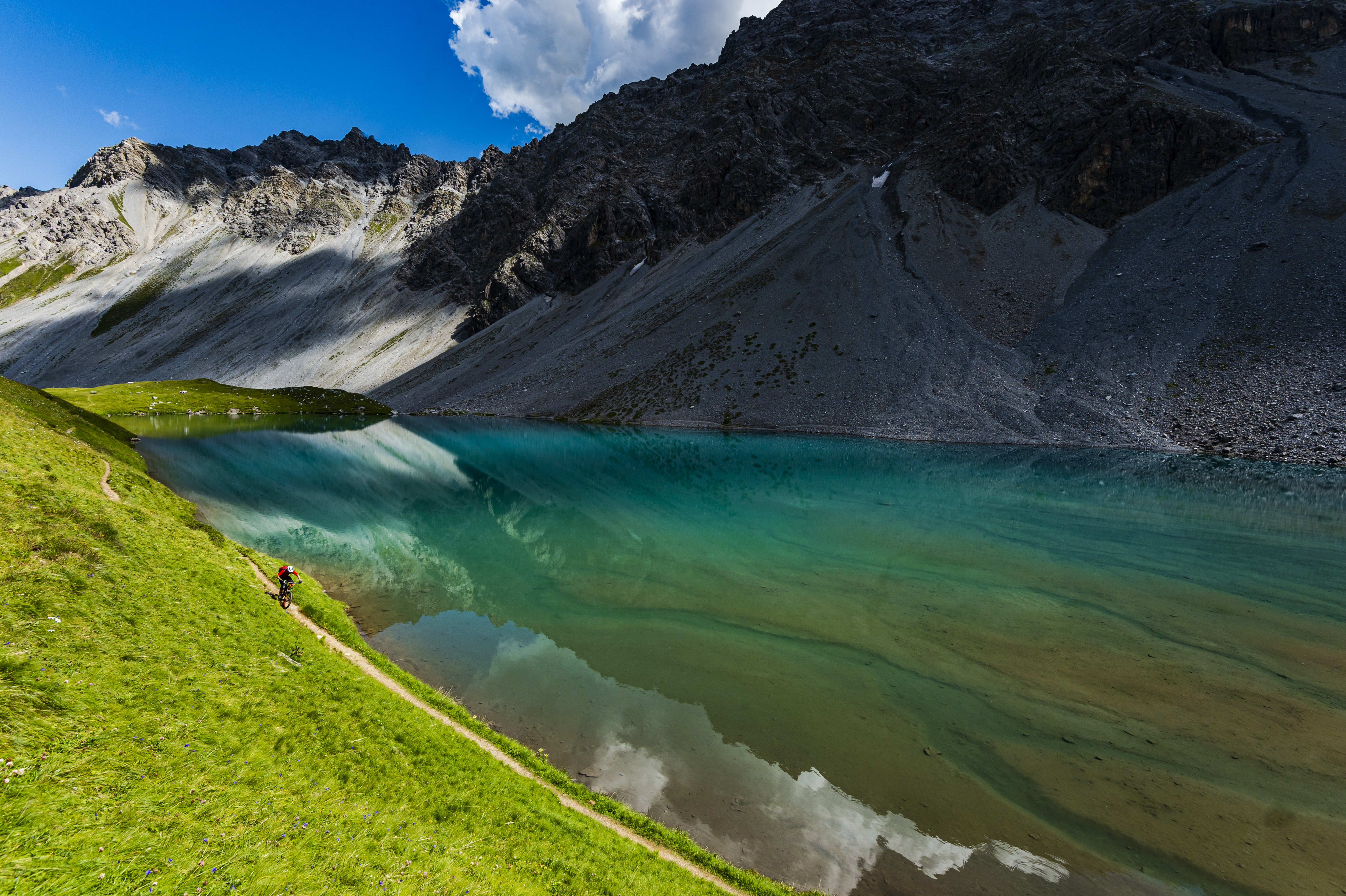 Janne Tjärnström riding by Älplisee near Arosa, Switzerland.