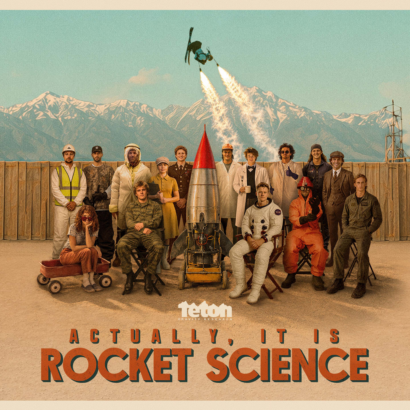 Group in Norrøna apparel posing with a small rocket in a desert under a rocket-propelled skier.