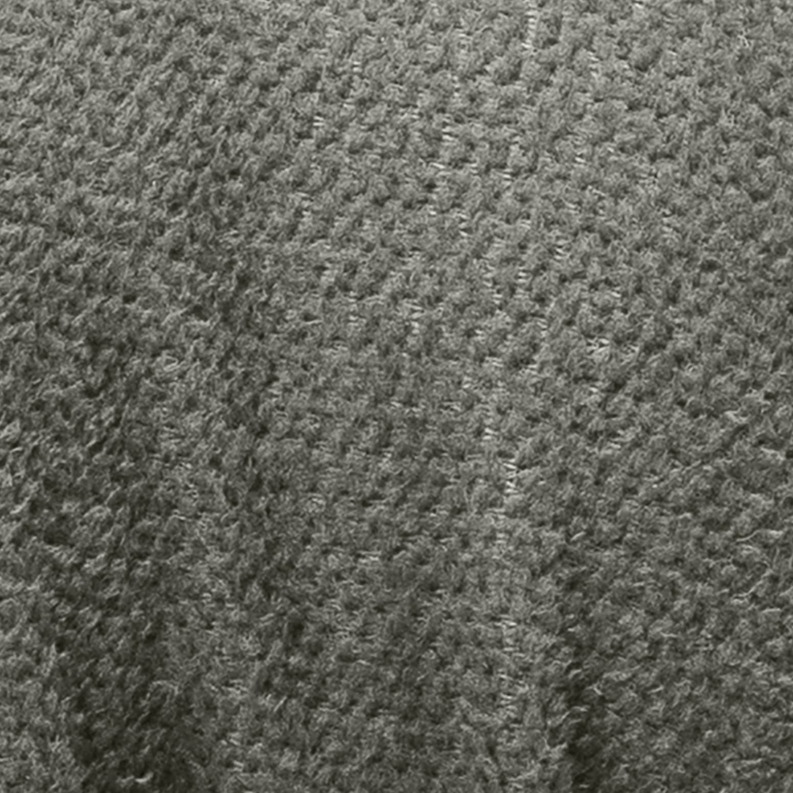 Close-up texture of Norrøna fabric. 
