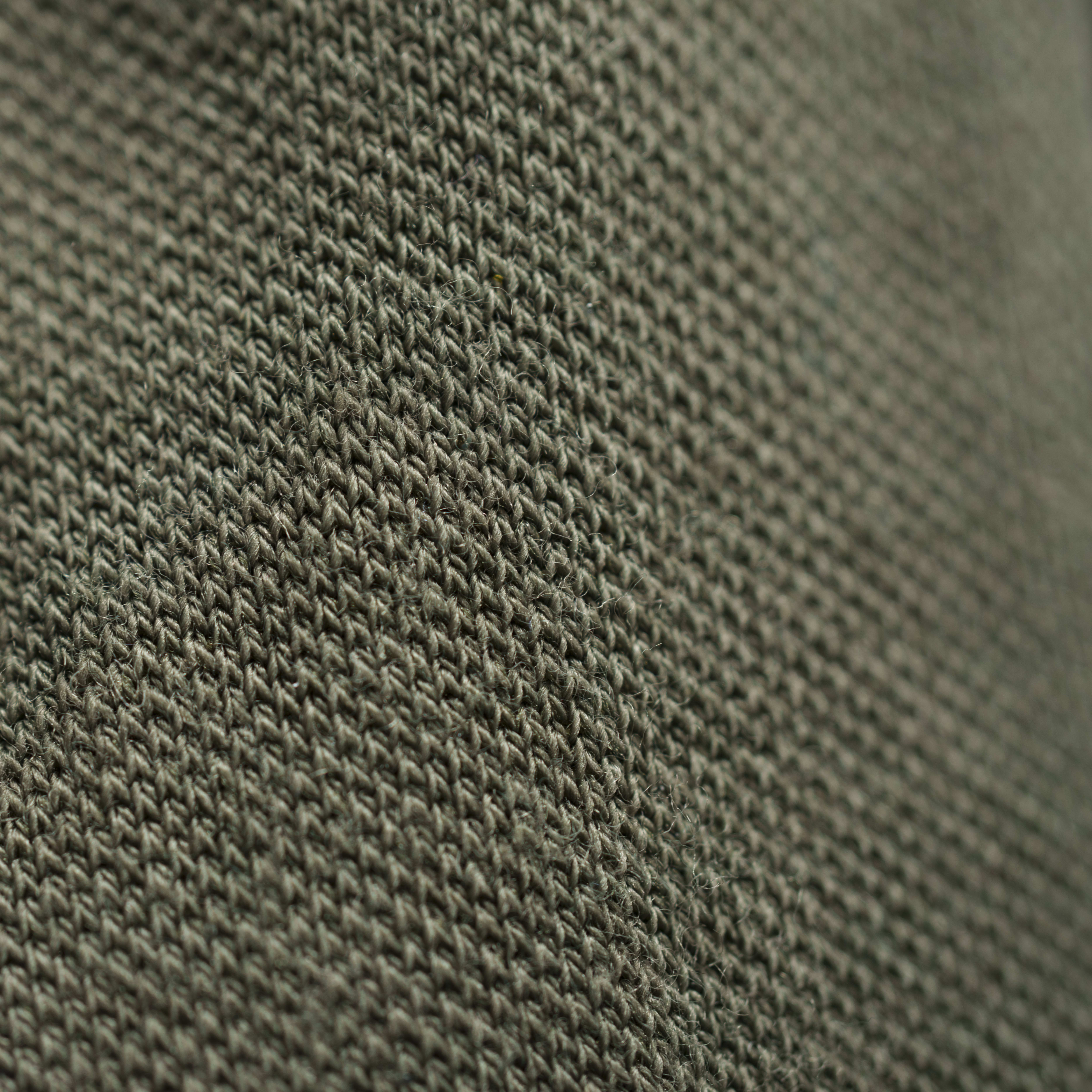 Close-up of textured fabric. This is a textile detail of a Norrøna garment.