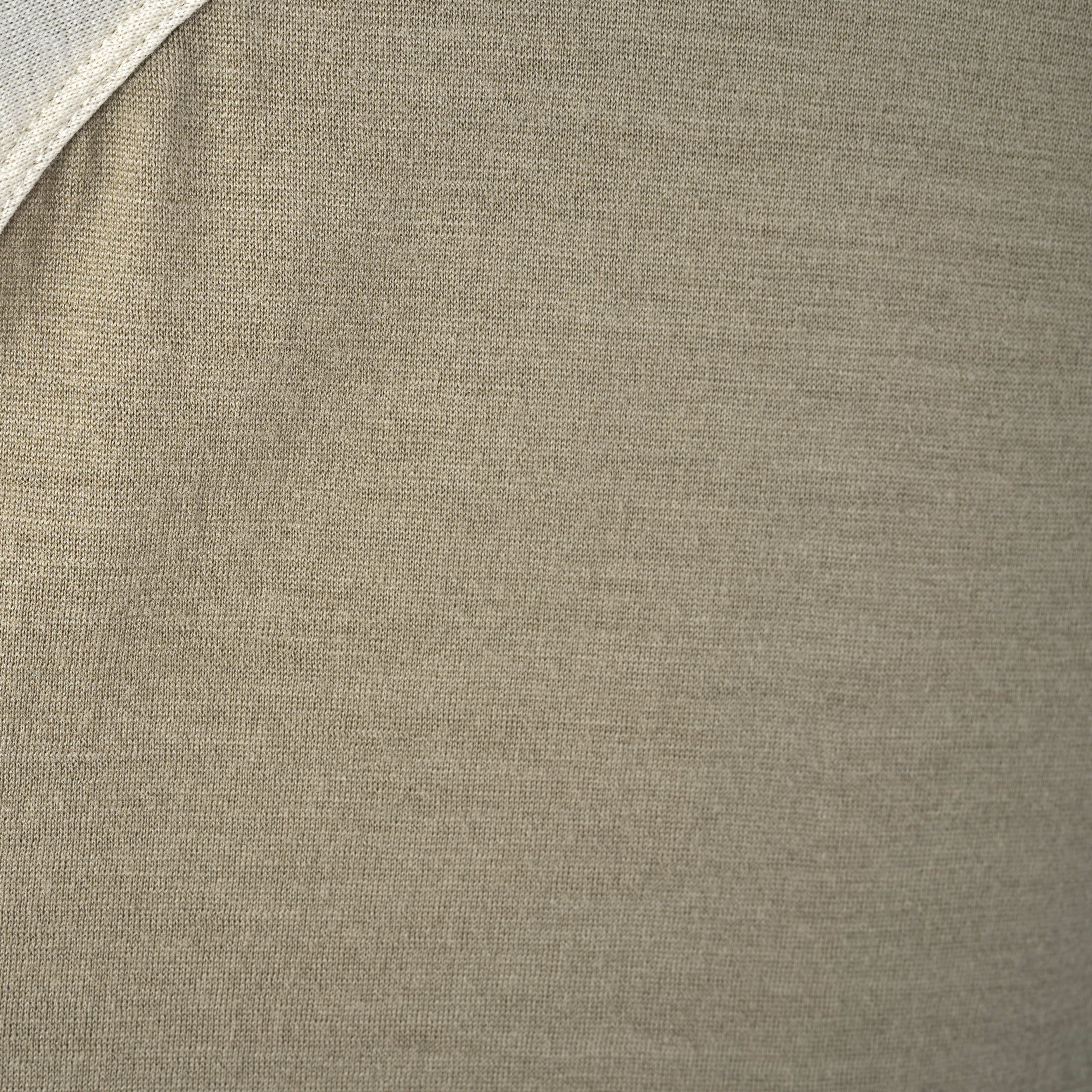 Close up of a brown and white Norrøna fabric.