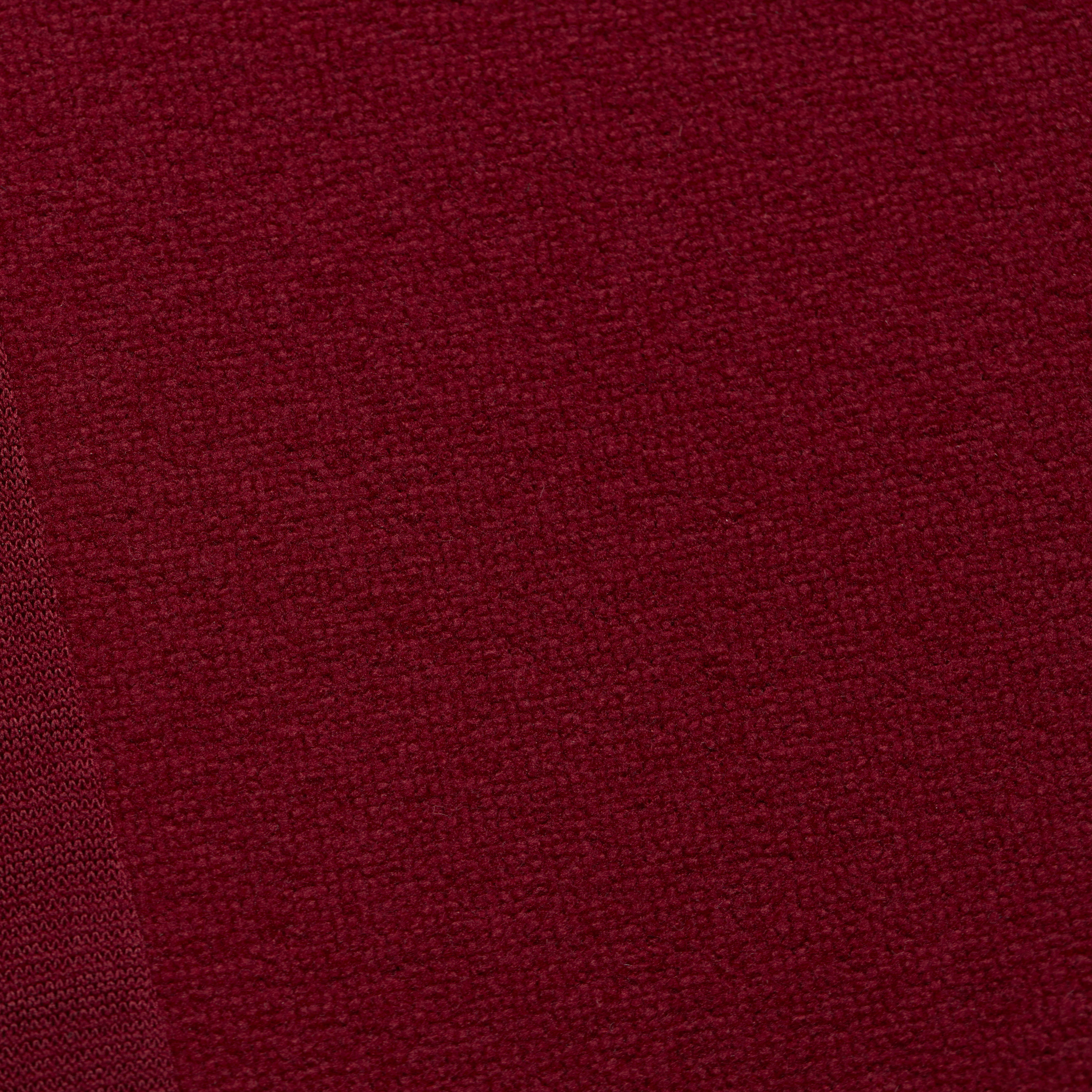 Close up of Norrøna fabric in a dark red color.