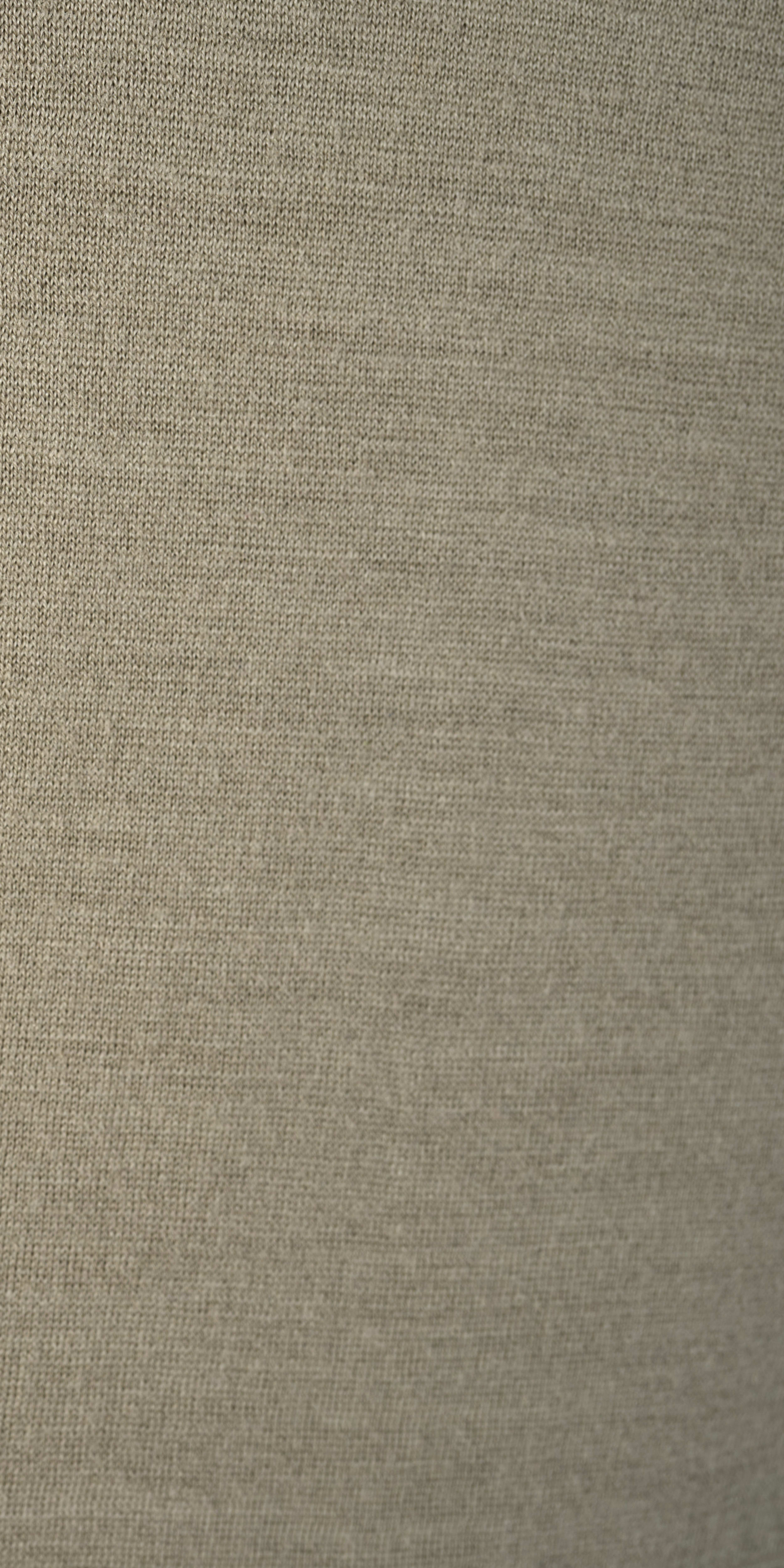 Close up of a brown and white Norrøna fabric. 
