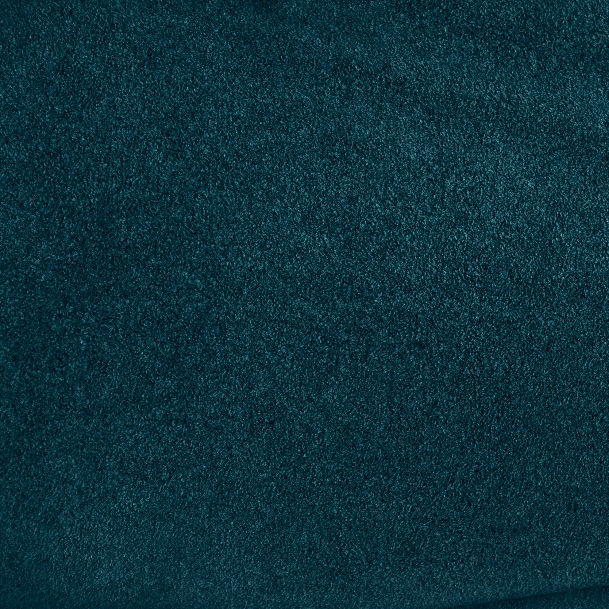 Close-up of a dark blue Norrøna fabric texture.