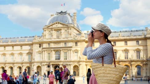 Tourist taking pictures in Paris