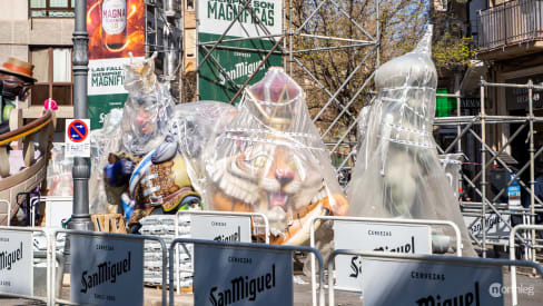 Fallas wrapped in plastic before the Plantà in Valencia.