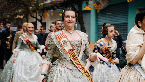 Fallera representing her falla in a parade - Valencia