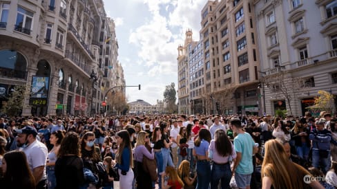 Crowd of people waiting for Mascletá in Plaza de Ayuntamiento during Fallas in Valencia