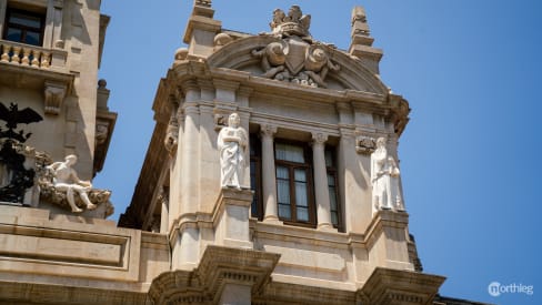 Figures on the façade of town hall in Plaza del Ayuntamiento in Valencia