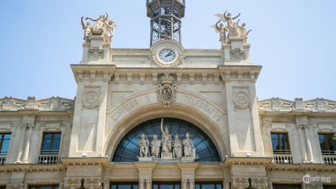 The sculptures on the façade of Palacio de Correos in Plaza del Ayuntamiento in Valencia