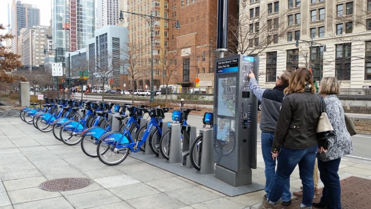 Tourist at Citi Bike station in New York City