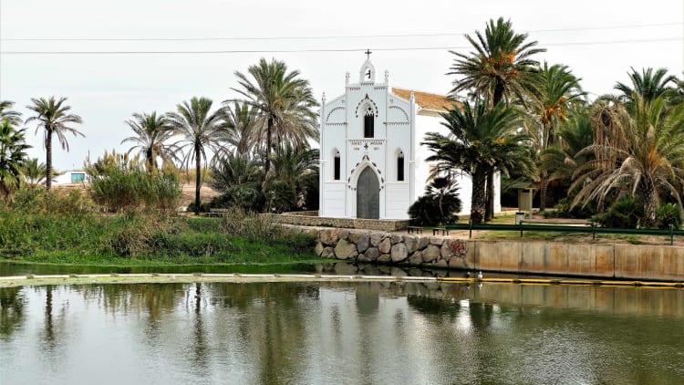 White traditional buildings of Alboraya with classic architectural style against a bright background