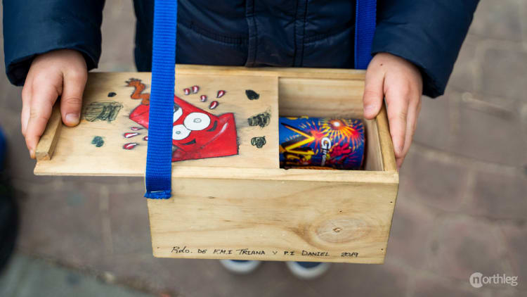 Child with box full of firecrackers- Fallas Valencia