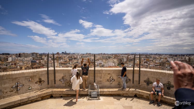 Panoramic view of Valencia's old town from the top of the Miguelete bell tower, showcasing historic buildings and urban landscape.