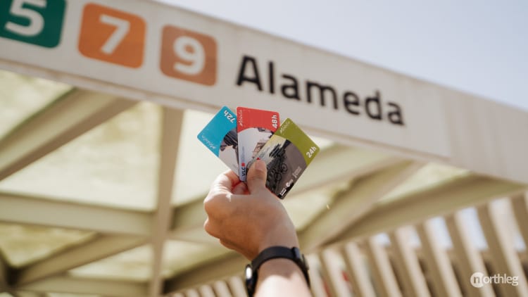 Close-up of Valencia Tourist Card near metro station ticket validation area