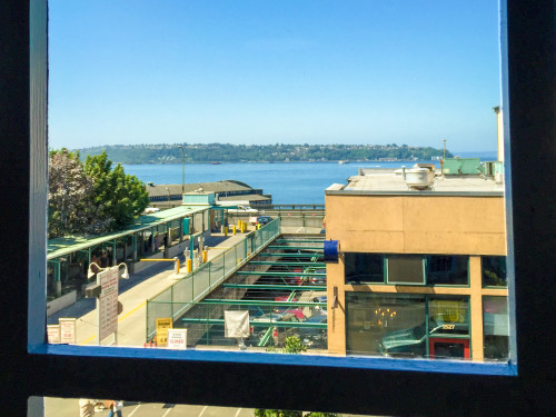 Window looking out onto Puget Sound from Holy Cow Records