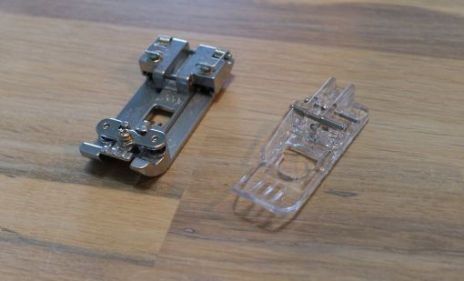 Läpinäkyvä paininjalka Jukin peitetikkikoneelle