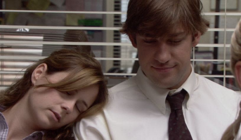 pam with her head on jim's shoulder