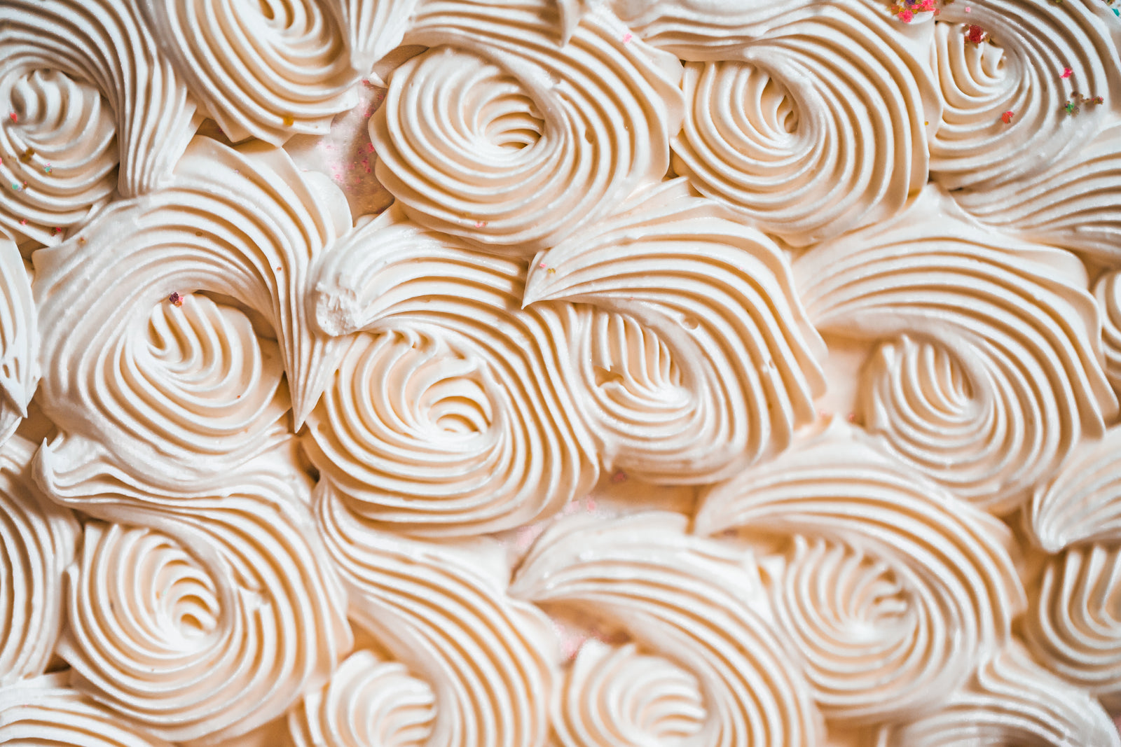 Close-up of frosted buttercream swirl texture