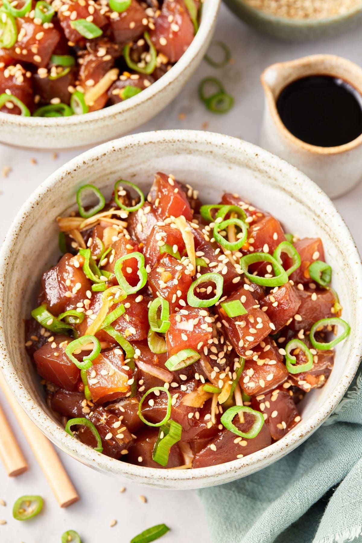Ahi poke — cubes of raw yellowfin tuna with shoyu, sesame oil, sweet onion and limu seaweed