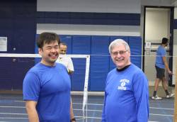 Doug Kane (right), adult sports coordinator for Whitefish Bay Recreation, with one of his badminton program participants. Photo courtesy of Anthony Iracki. 