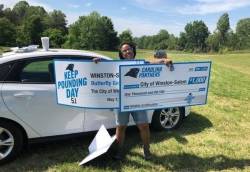 Emerald P. Bowman, Sr. Special Projects Manager for City of Winston-Salem, displaying grant awards to fund the NFL-Carolina Panthers Keep Pounding Day Project Photo courtesy of Emerald P. Bowman.