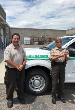 Jody Becker (right), park ranger for Gilbert Parks and Recreation, standing with Brian Hiapo, wildlife rescue. Photo courtesy of Sarah Sharits.