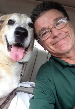 Wally Majors, director of Boynton Beach Parks and Recreation Department, with his favorite dog, Charlie. Photo courtesy of Diane Valentini.