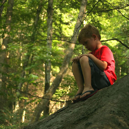 Child on rock 410