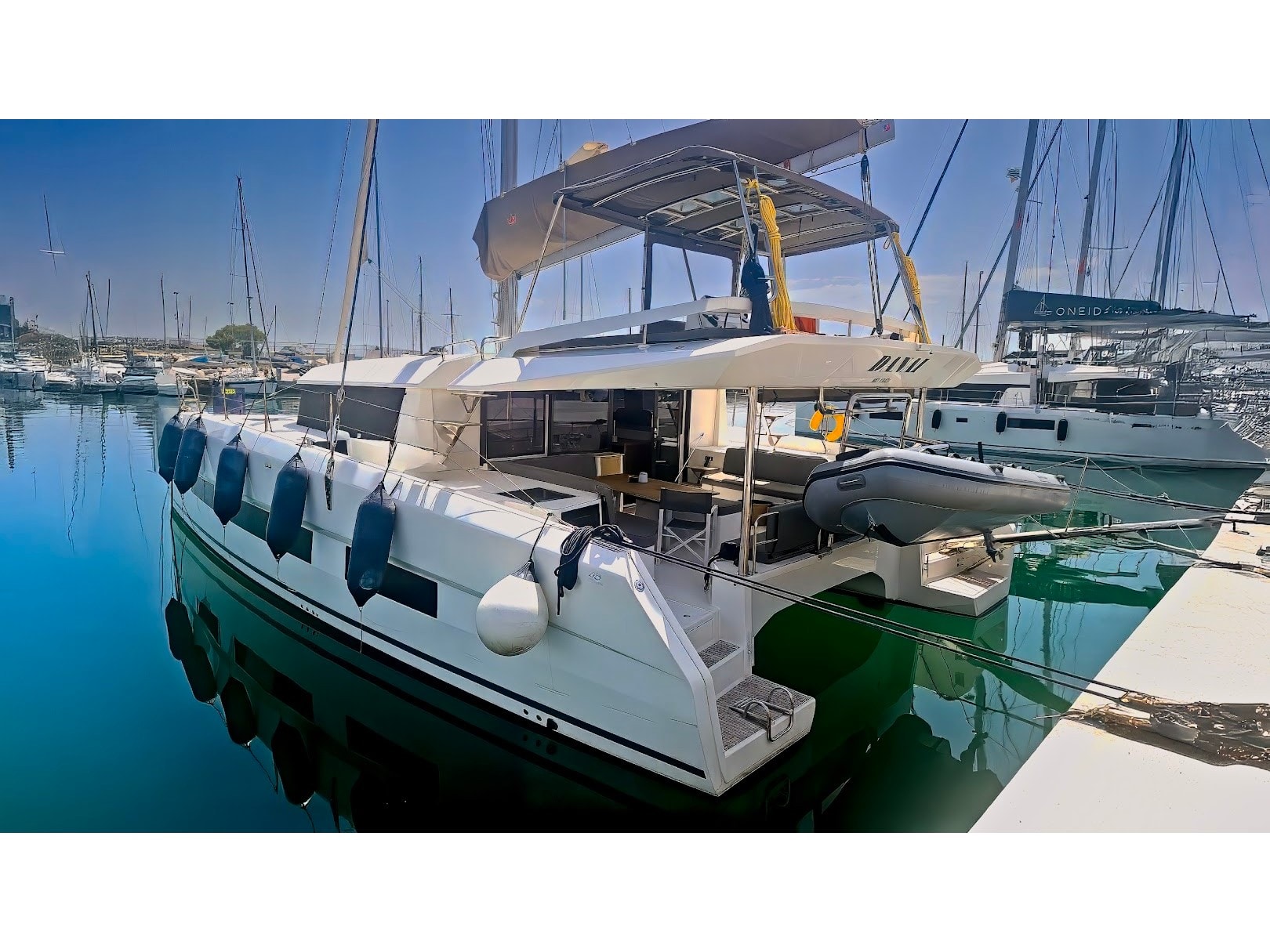 Danai - Skippered Dufour Catamaran 48 moored at Tourlos Marina