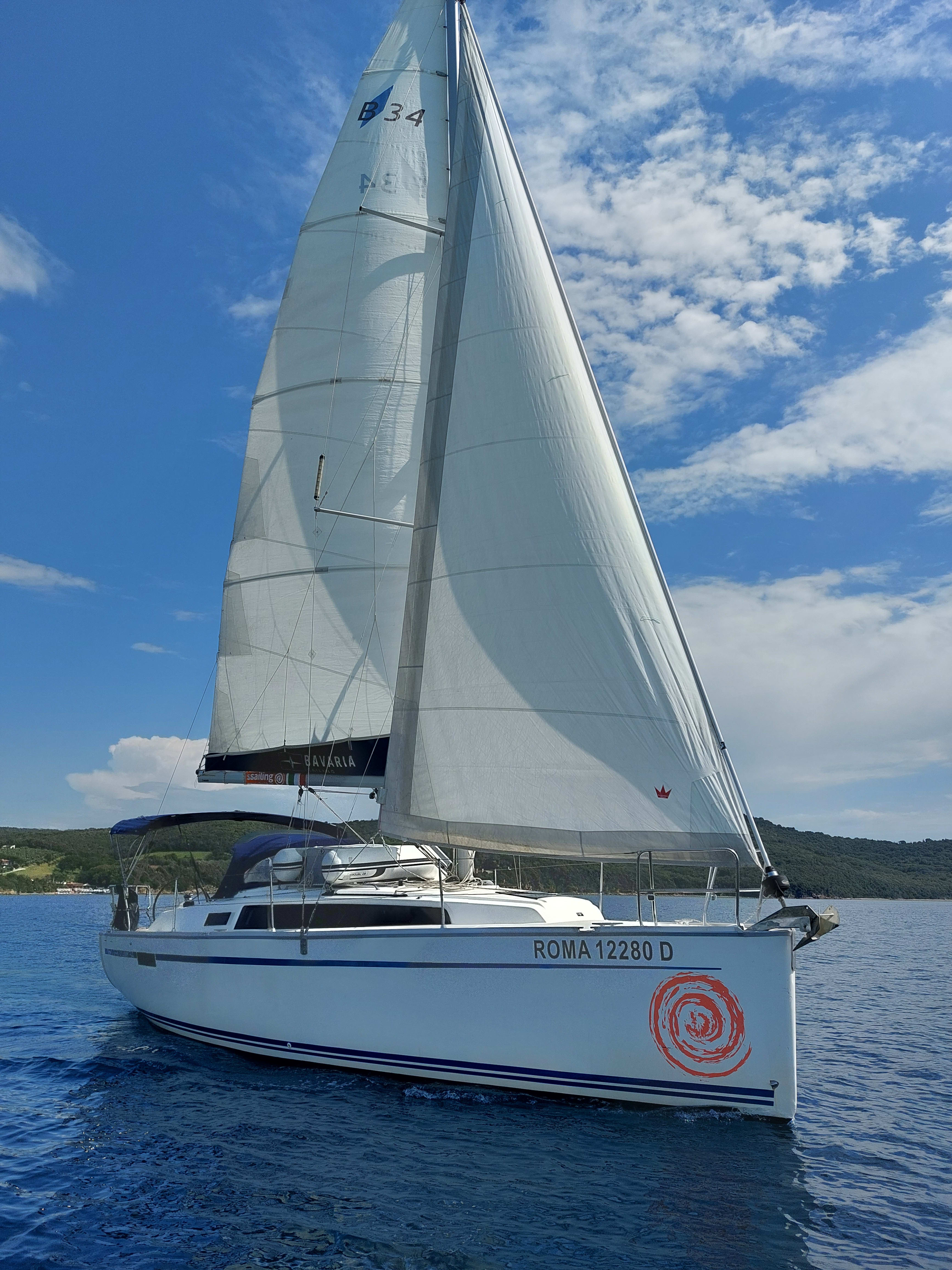Olympia Bavaria Cruiser 34 біля причалу Puntone / Marina di Scarlino
