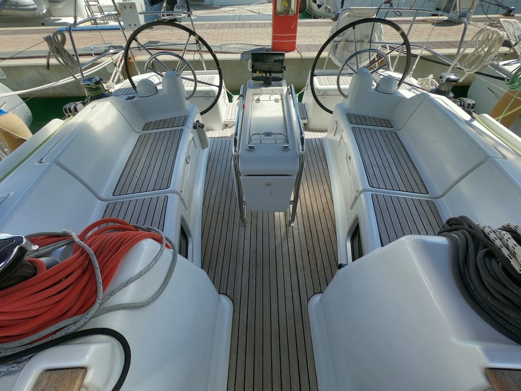 Piedanlo II Sun Odyssey 409 moored at Marina di Portisco