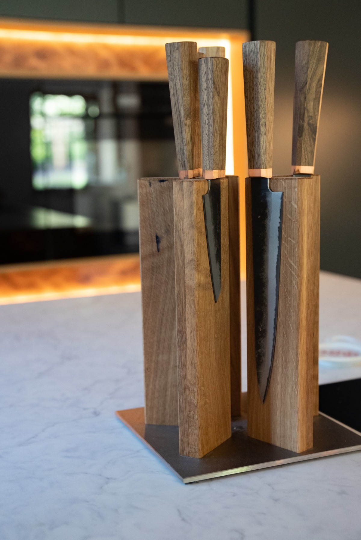 a wooden block of high end kitchen knives