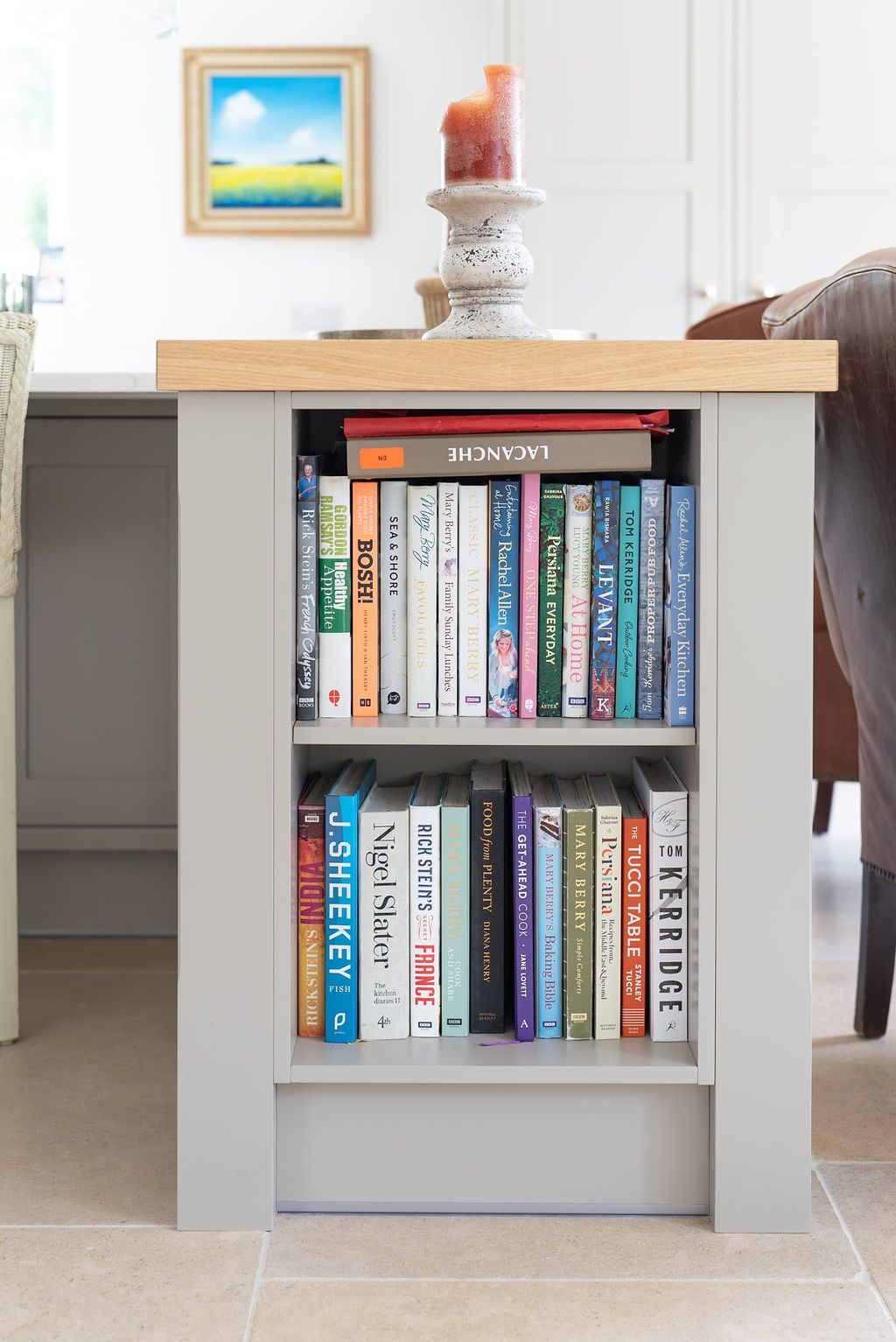 A cookery book storage shelves in a kitchen