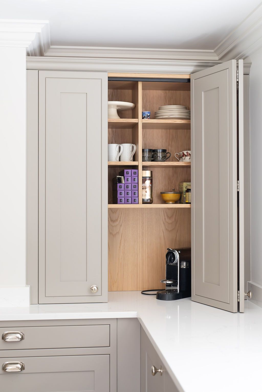 A light grey worktop bifold dresser in a Sylvarna Kitchen