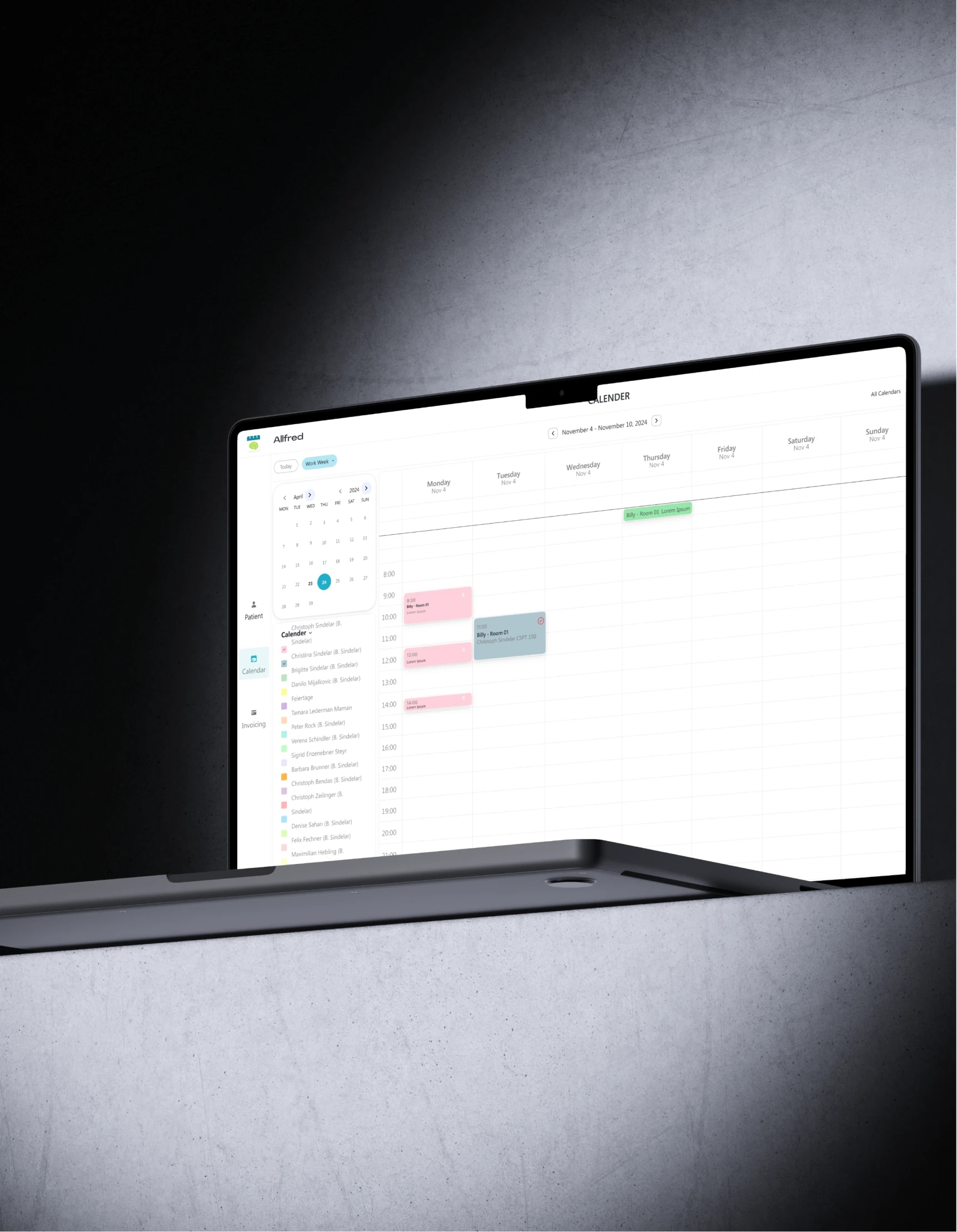 Allfred calendar on a laptop in a dark room