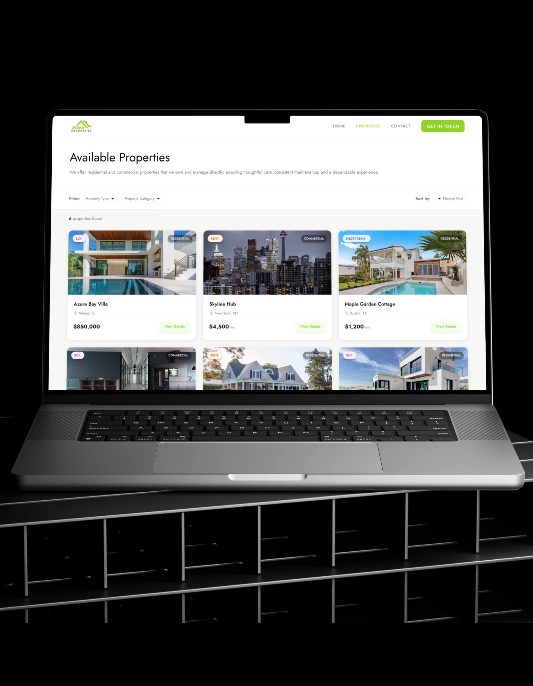 ZRM property listings on a laptop