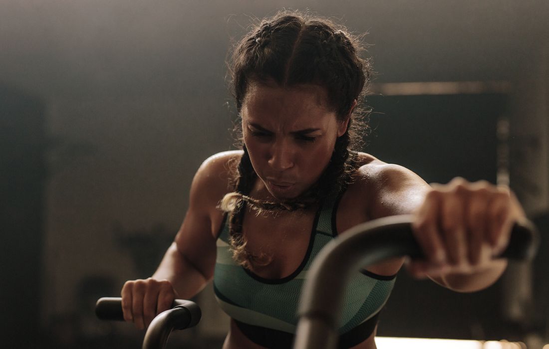woman on cycling machine