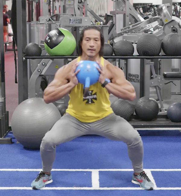 man doing squat and crab walk side to side