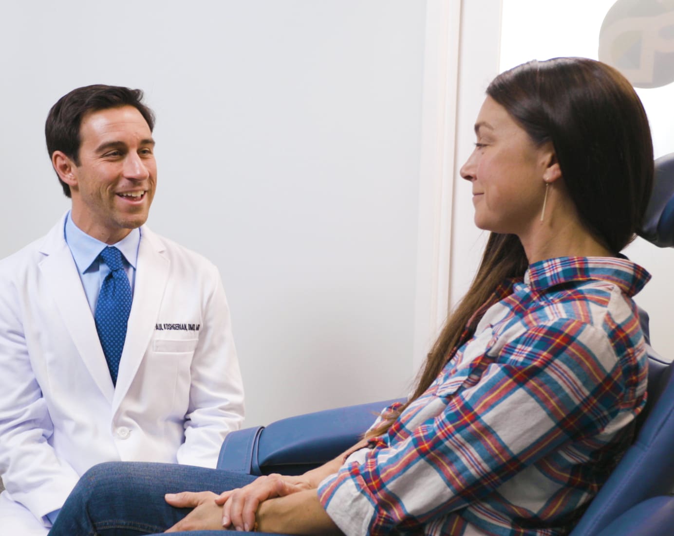 Dr. Koshgerian talking to patient