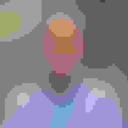 Paul DI EXT BG facewall