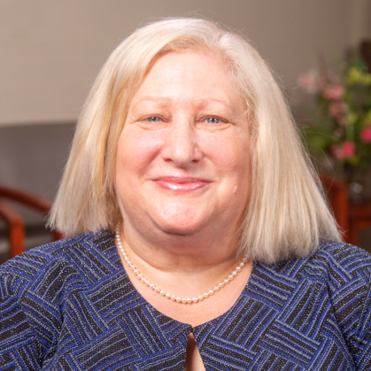 Caroline underwent a tooth extraction, bone graft, and got a dental implant placed