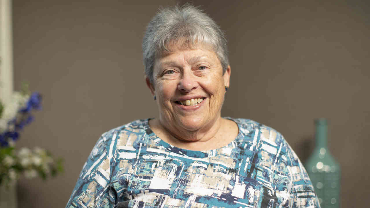 portrait image of sharon after dental implants