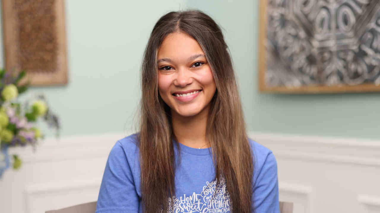 portrait image of evelyn after dental implants